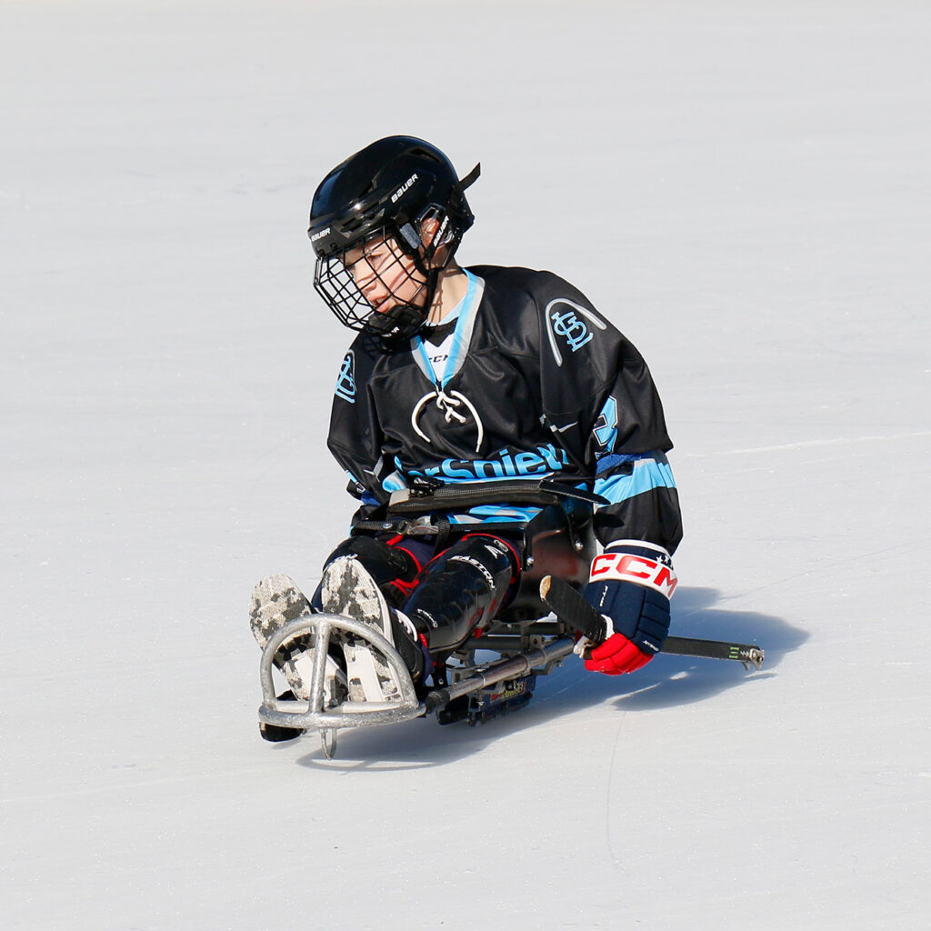 kid in hockey gear